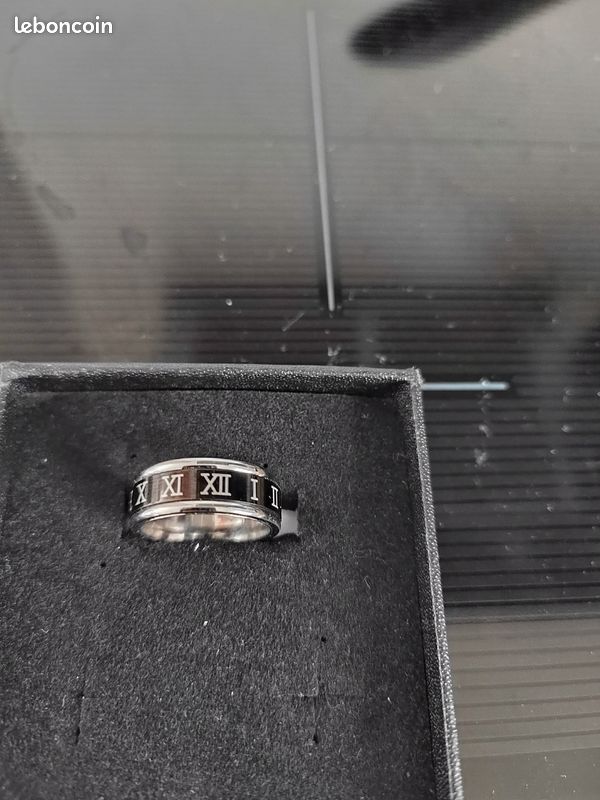 Bague tournante anti stress chiffres romains acier inoxydable noir et doré