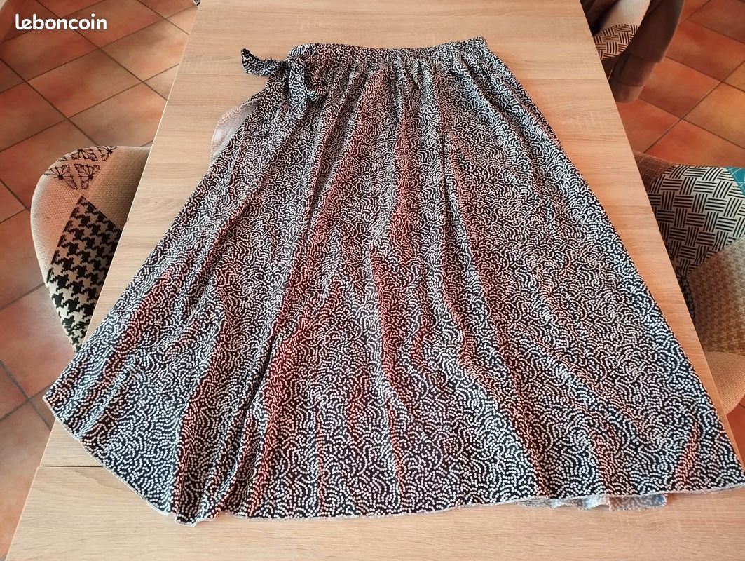 Éblouissante jupe bohémien en polyester rose imprimé géométrique devant