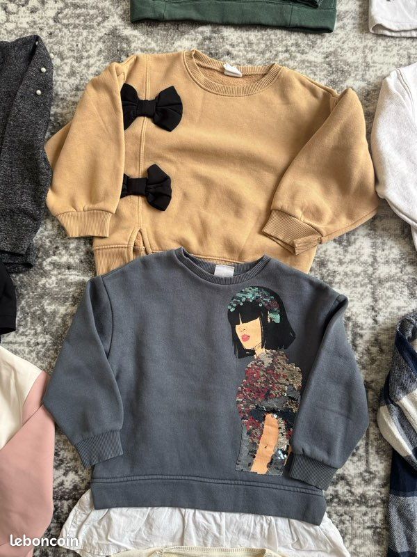 Pull tricot multicolore à rayures. | FR