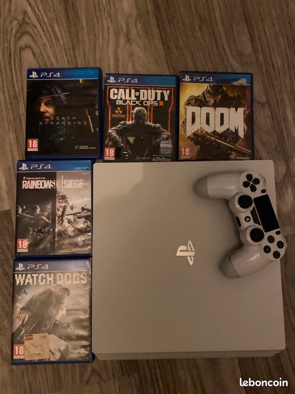 Ps4 pro avec manette qui bug un peu et 5 jeux (image 1)