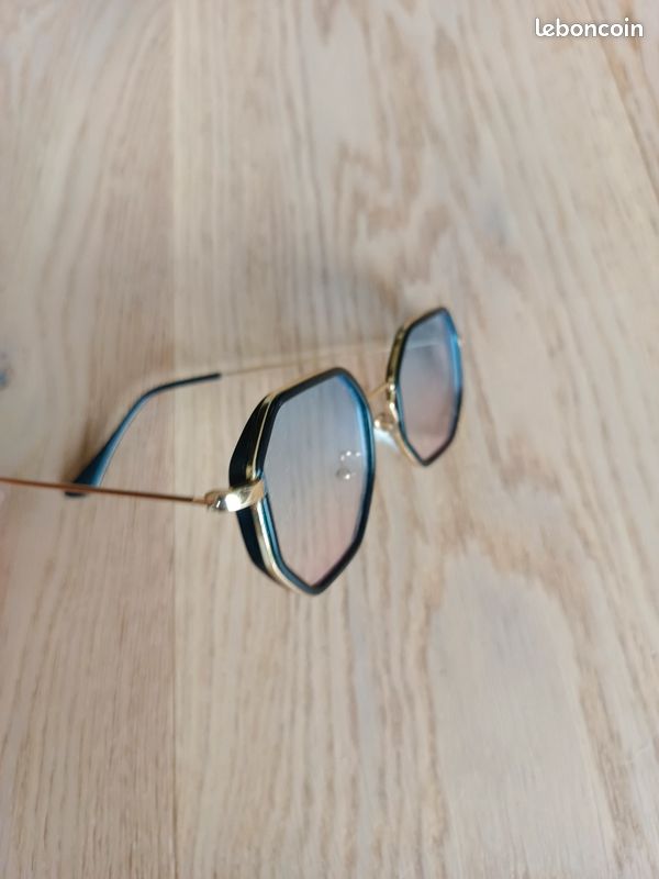 Lunettes homme dorées et bordées de notre (image 2)