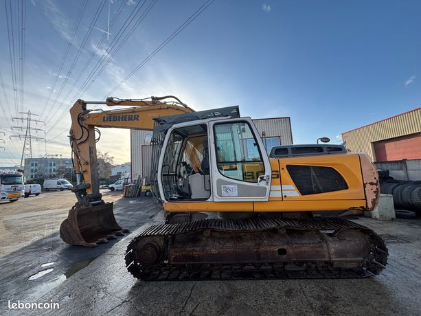 Pelle Conrad Liebherr 310 en jaune foncé au 1:50