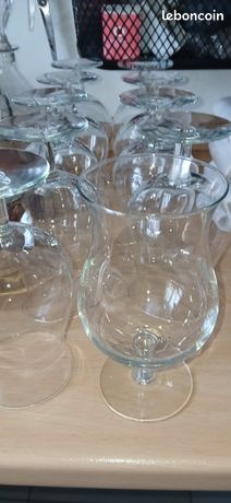 6 verres à eau et 8 flûtes à Champagne forme tulipe, en cristal, H. 17 et H. 19 cm