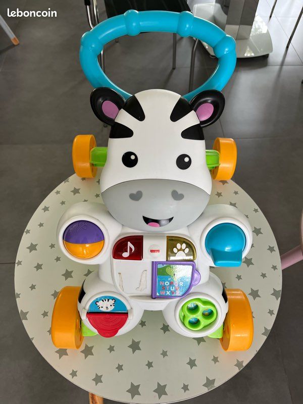 Pousseur trotteur Fisher price (image 1)