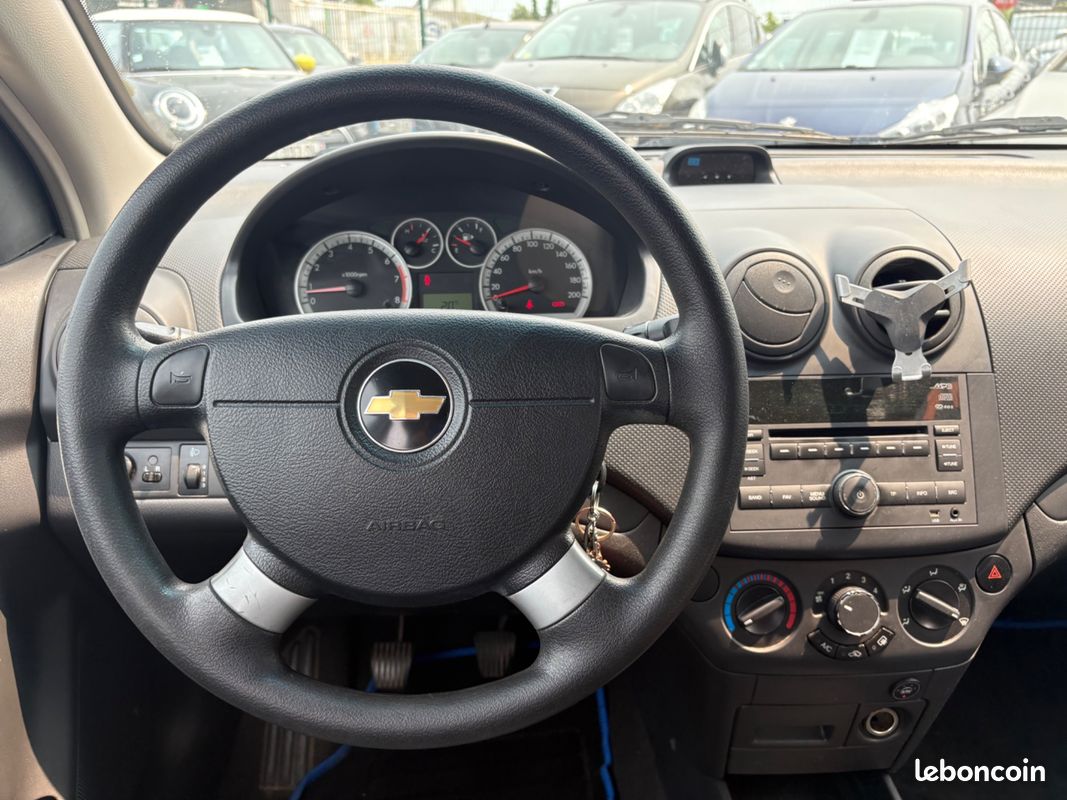 Chevrolet aveo 1.2 gpl 80ch - climatisation - vitres av elec (image 29)