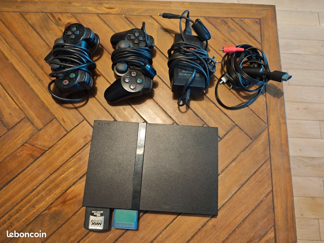 PS2 Slim + jeux (image 2)
