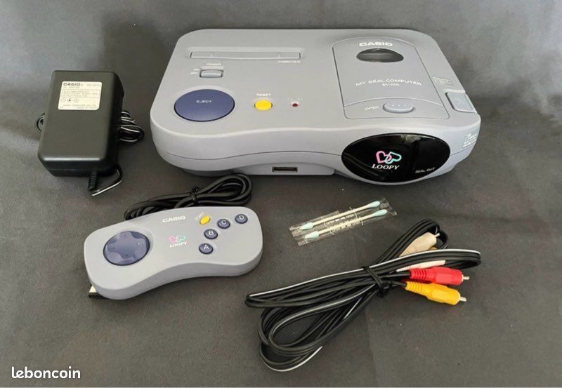 Je vends cette console Casio Loopy SV-100, une pièce rare du rétrogaming japonais. Fonctionnelle et en très bon état, elle ravira les collectionneurs - Type de produit : Console portable rétro - Mar (image 4)