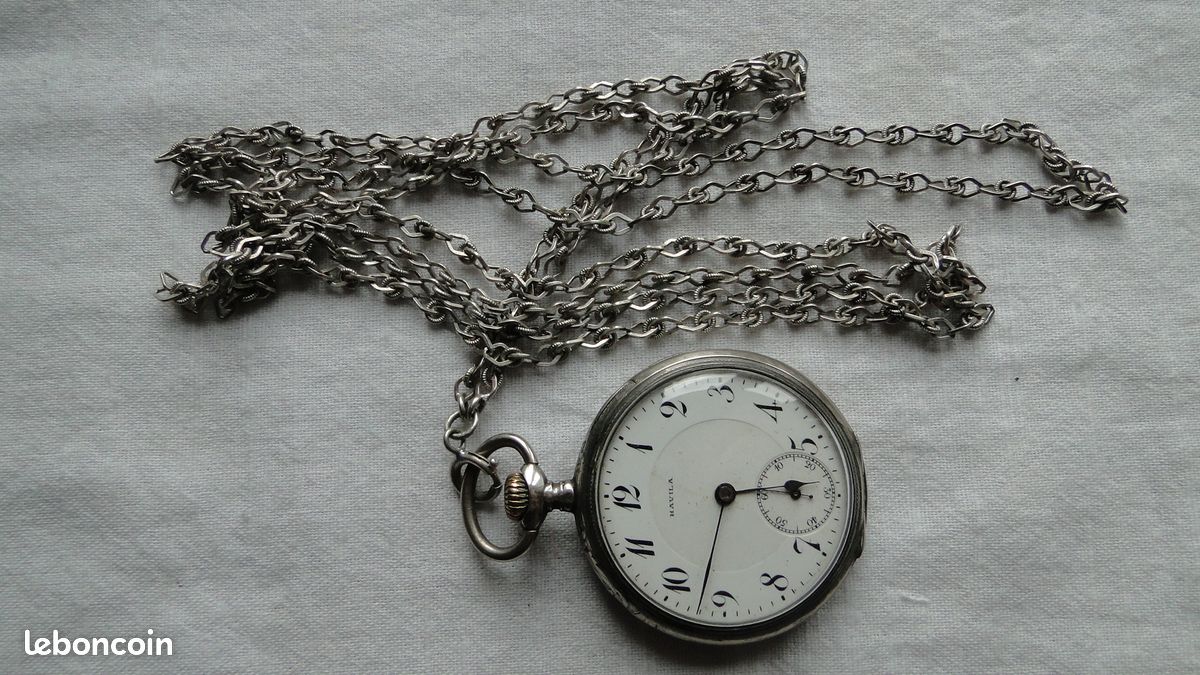 Montre de gousset en acier noirci début XXeme avec sa chaîne en métal doré - Montres & Bijoux