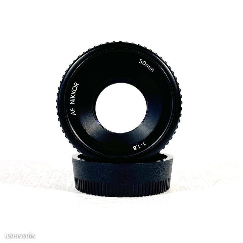 Nikon Objectif 50mm 1.8 Nikon serie E avec 2 bouchons un