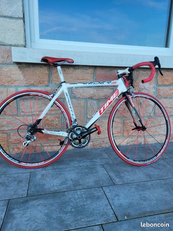 Vélo de course carbone Megamo Raise 00 AXS black Red AXS 12v 2025