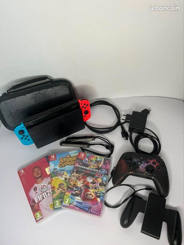 Nintendo Switch et accessoires +3 jeux+ Manette et chargeur (image 1)