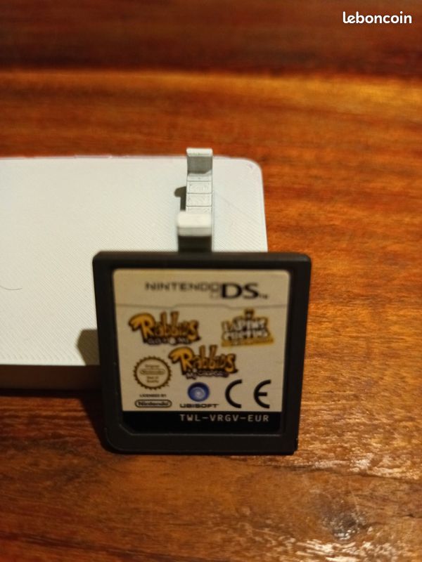 Jeu Nintendo DS – Les Lapins Crétins Retour vers le passé – bon état (image 1)