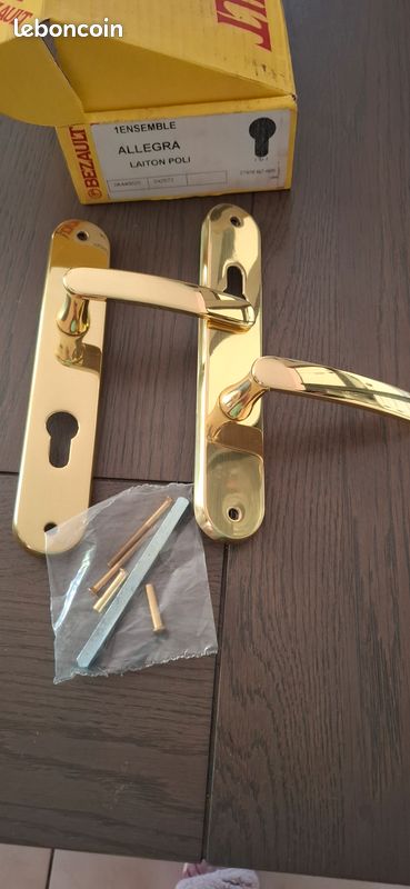 Poignée de porte laiton poli neuve (image 1)