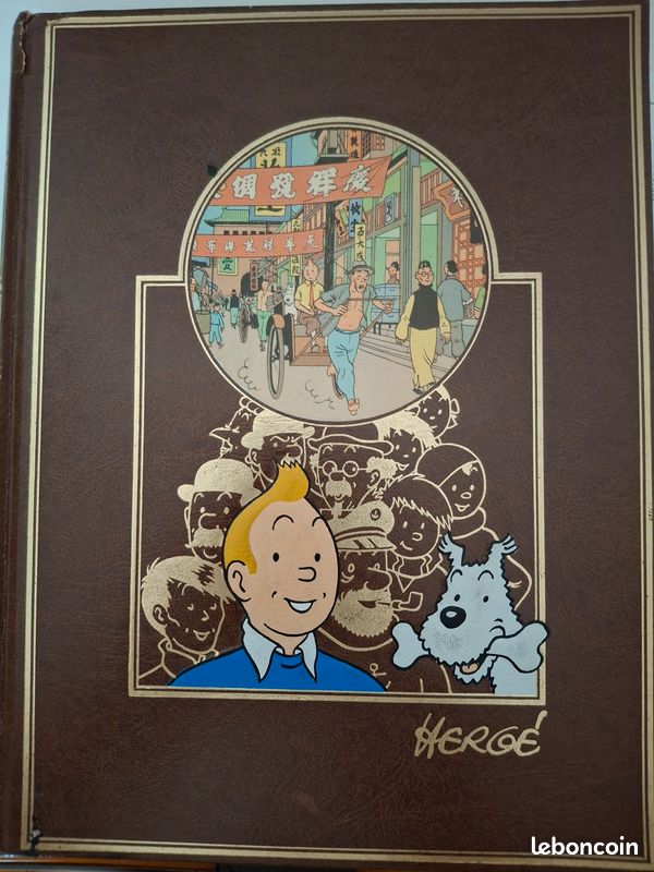 Reliure carton imitation Cuir de 270 pages ( Volume 3 )avec 2 aventures de TINTIN et plusieurs de JO ZETTE et JOCKO ( toutes écrites par Hergé ) (image 1)