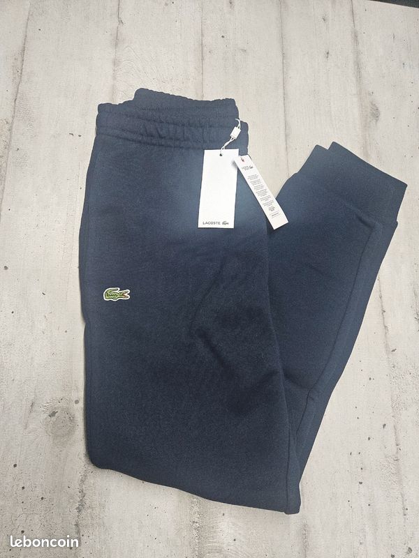 Pantalon de survêtement jogging polaire Lacoste bleu marine taille XS (image 1)