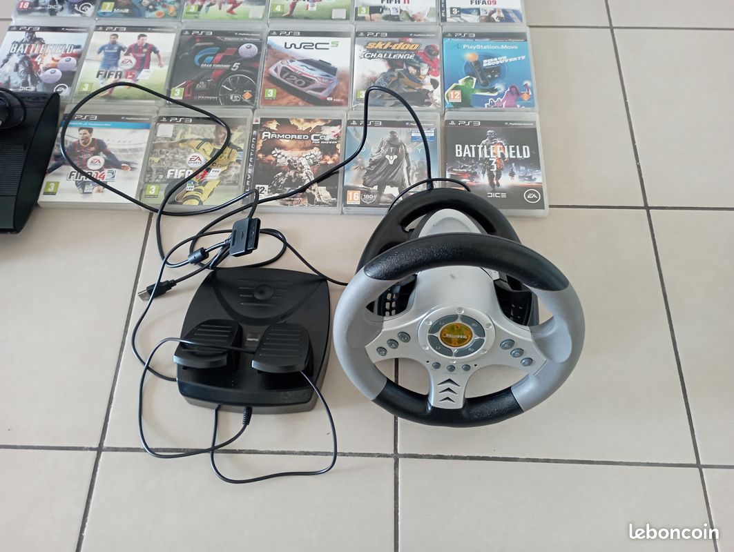 Vends ps3 Ultra Slim 500Go + volant + 23 jeux (image 2)