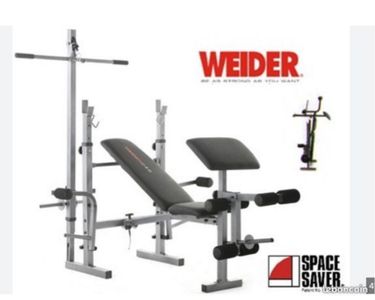 Banc de musculation d'occasion à vendre avec poids, barre de muscu