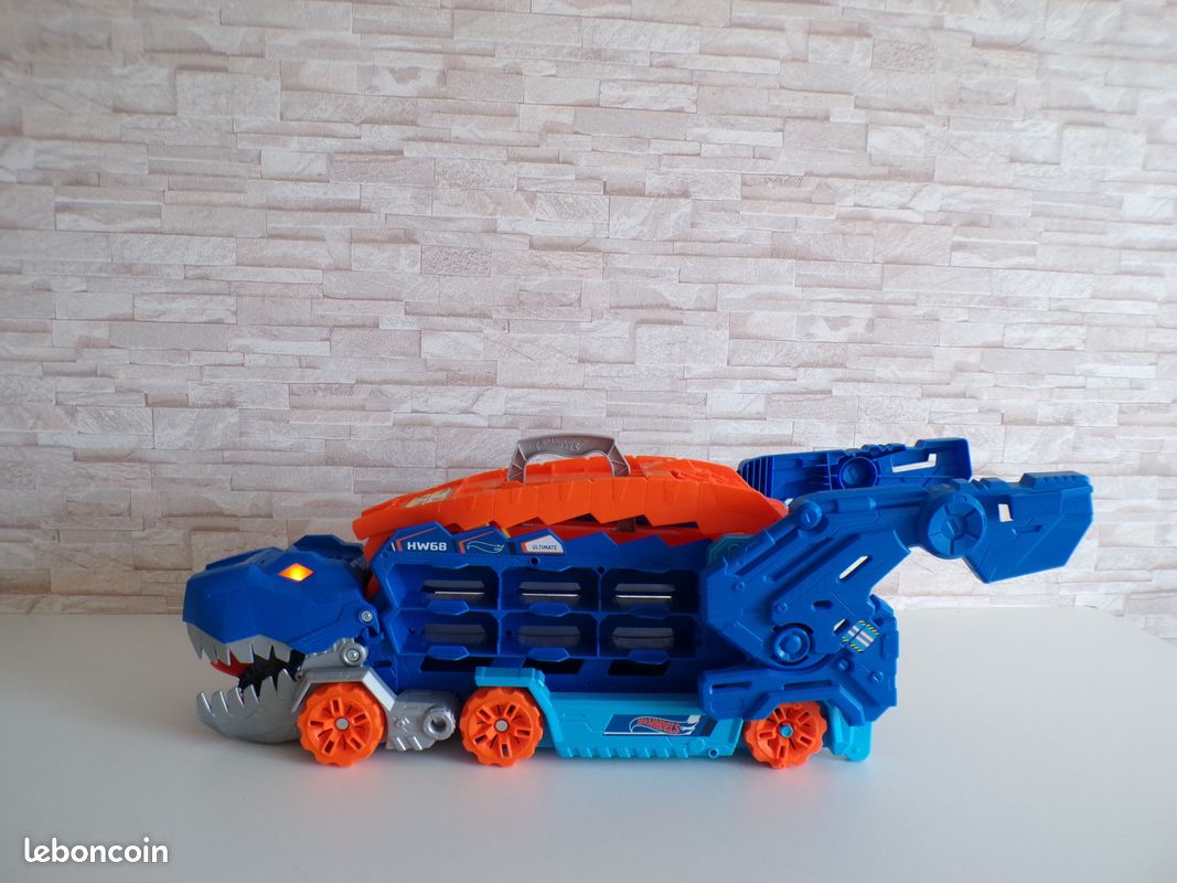 Hot wheels city - transporteur geant t rex 2 en 1 : camion et dino piste de course - sons et lumieres - set jouet vehicules + carte - Voiture - Achat & prix Hot wheels city - transporteur geant t rex 2 en 1 : camion et dino piste de course - sons et lumieres - set jouet vehicules + carte - Voiture - Achat & prix