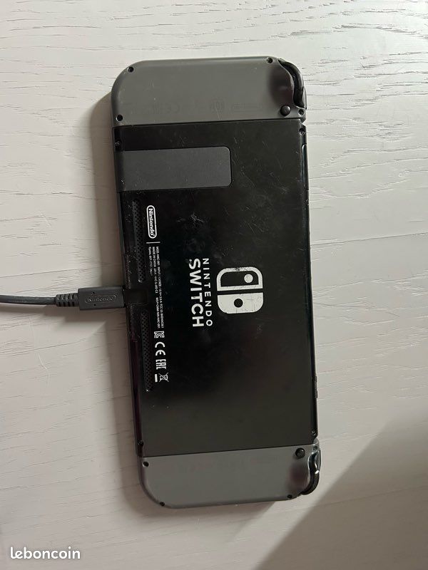Switch 1 avec joycon et jeux et connecteur tv (image 2)