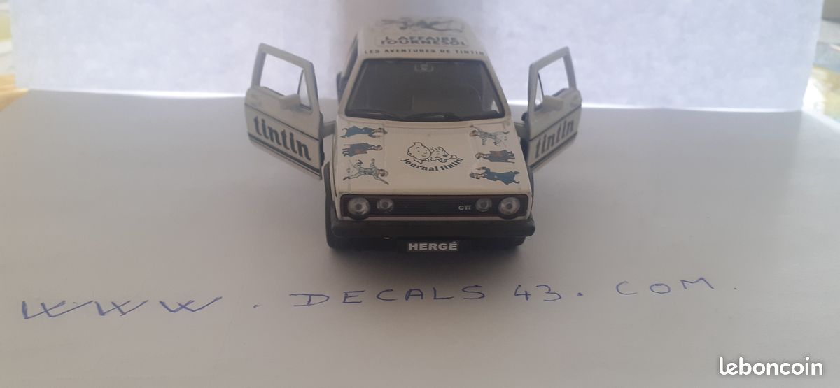 Vw golf gt1 serie 1 les aventures de tinitn sur base welly 1/36 (image 1)