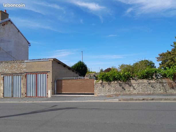 Terrain constructible + 2 garages