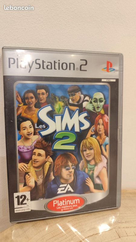 Jeu PS2 les Sims 2 avec boîte d'origine, notice et cd (image 1)