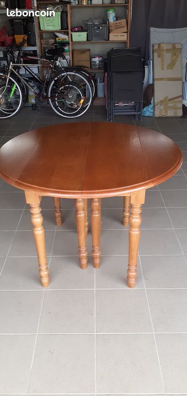 Table de salle à manger neuve bois massif chêne clair 105 cm de diamètre plus 6 rallonges de 40 cm .possibilité de faire une table de 105,145,185,225,265,305,10 à 12 personnes confortablement assises (image 1)