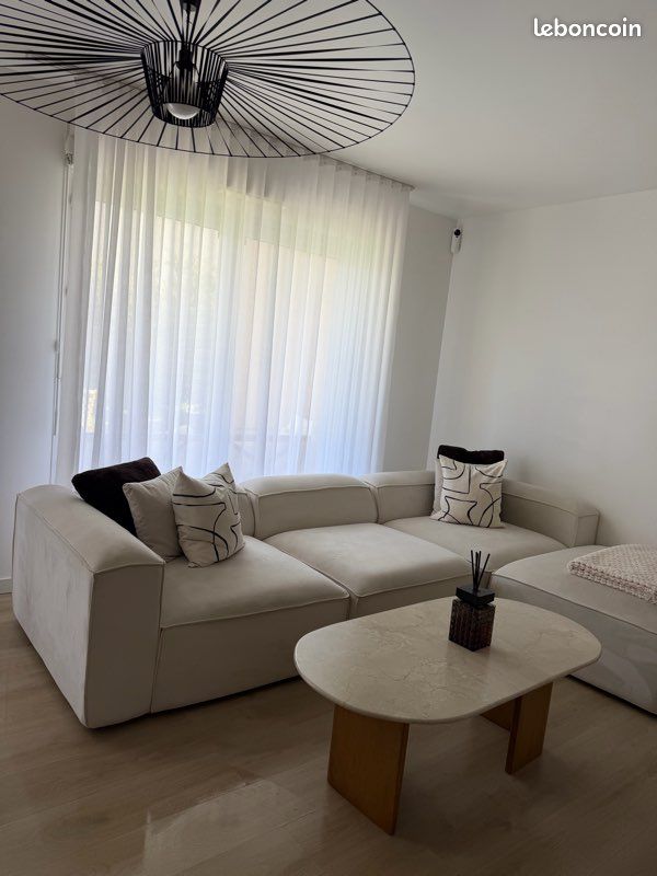 Canapé beige (image 1)