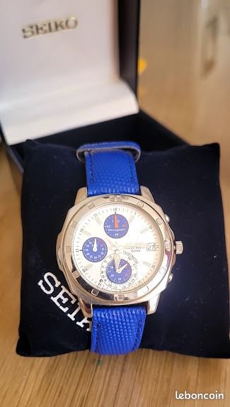 Montre Seiko Chronographe Quartz – Réf. V657, Boîtier 44 Mm, étanche 100 M, Acier, Bon état