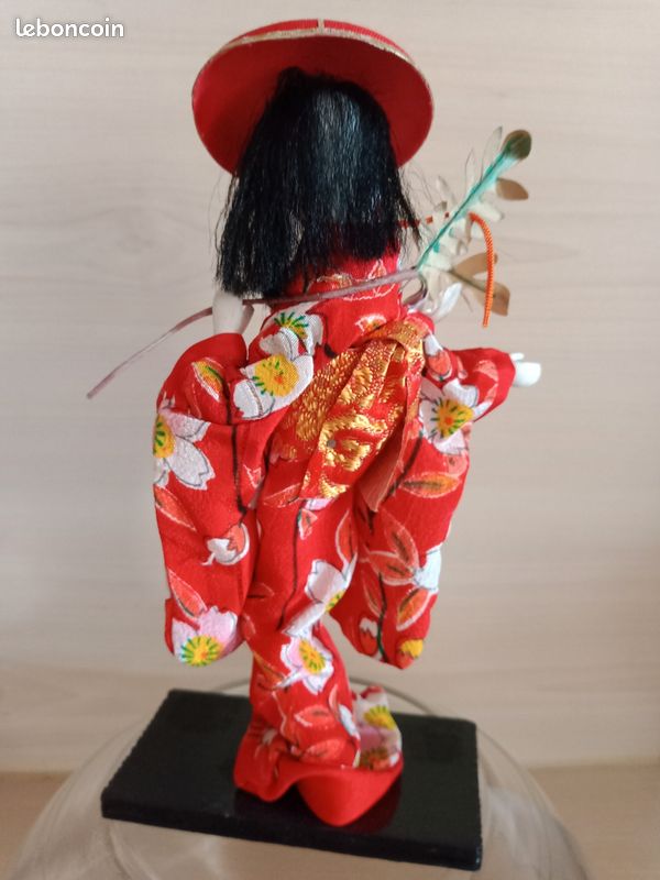 1890s Japan - Geisha Playing the Shamisen - A woman practicing the shamisen. 19t