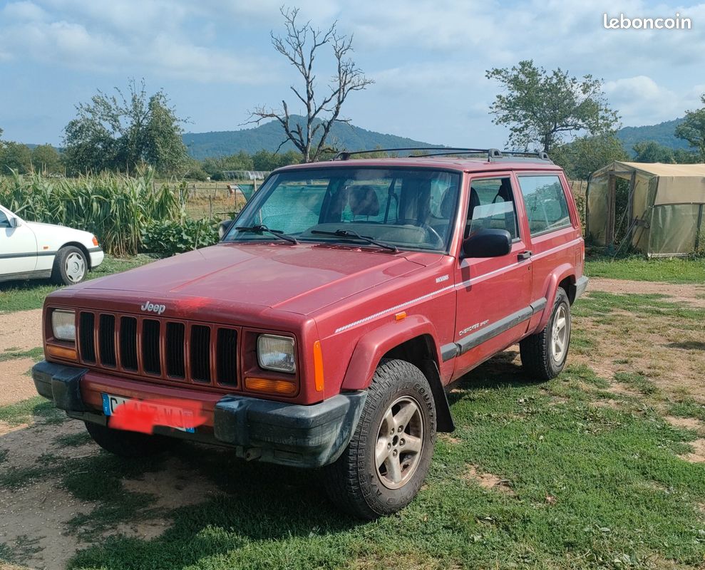 Jeep cherokee rouge - tres bon etat - 4500 euros (image 1)