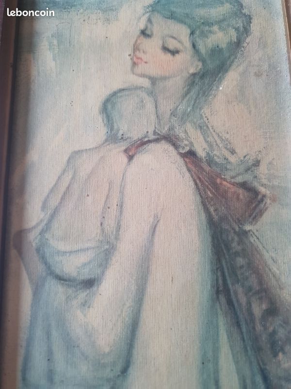Dame avec son bébé dans les bras (image 2)