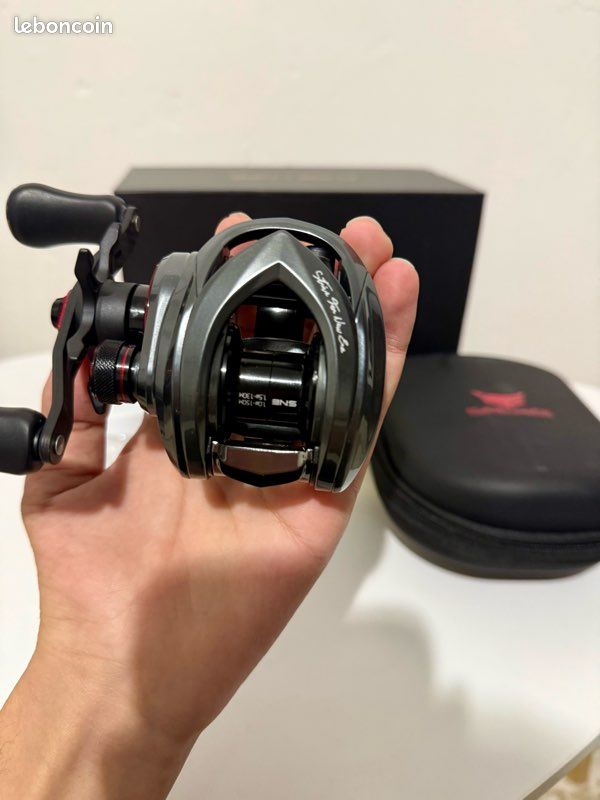 Moulinet pêche métallique Lézard avec injecteur visible - Test et Avis