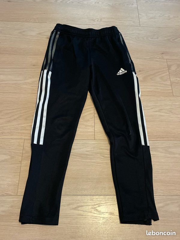 Jogging noir de la marque Adidas, taille 9 10 ans (image 1)