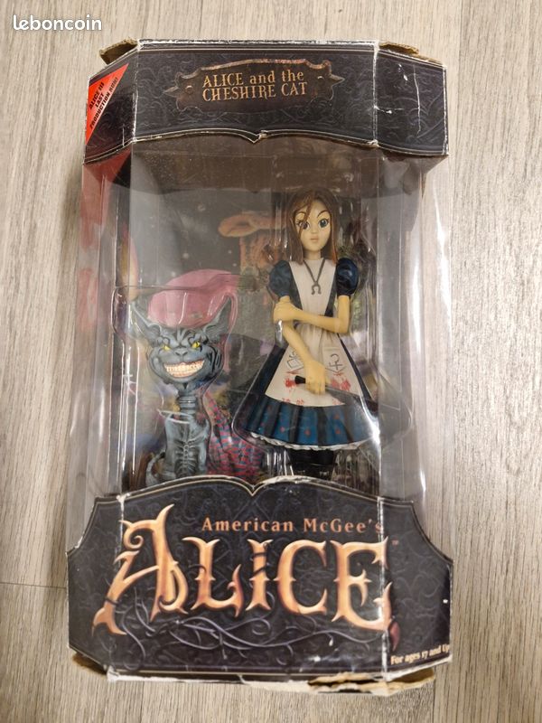 Nano figurine métal chat du Cheshire Alice Disney - Destination figurines