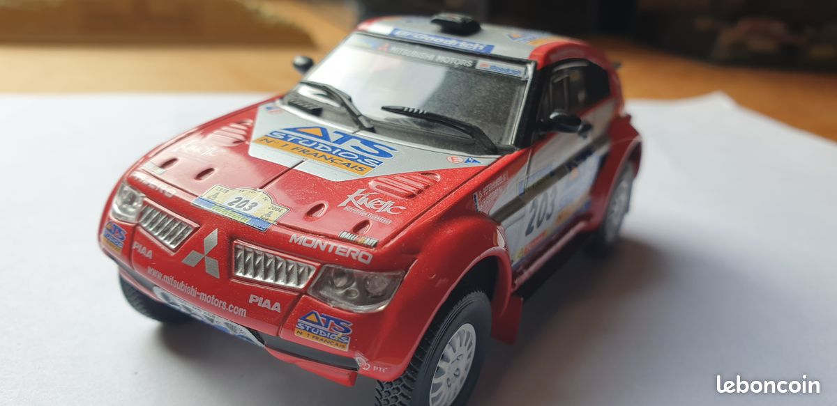 Miniature Solido 1/18 – Mitsubishi Pajero Evolution 2004 – En Boîte – Occasion