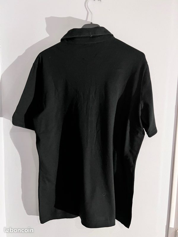 Polo noir MC femme LACOSTE Taille 46 (image 2)
