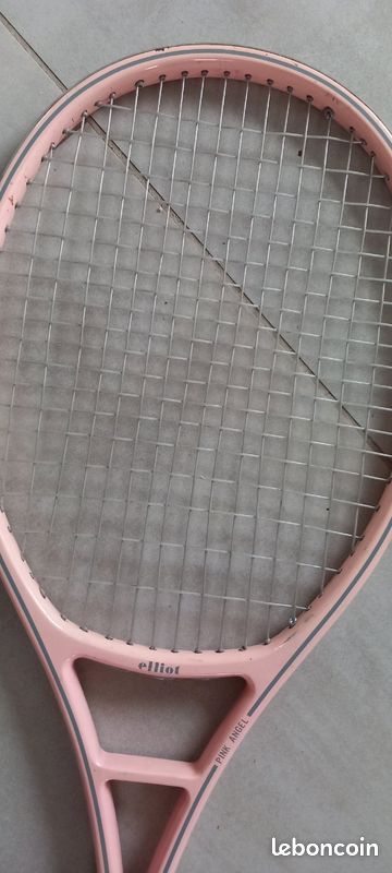 A gold 24k complete gold tennis racket with golden strings a... by