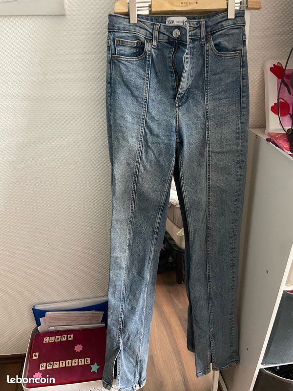 Jean avec fente en bas Vêtements