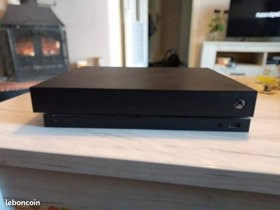 Xbox one x 1To + 14 jeux (image 1)