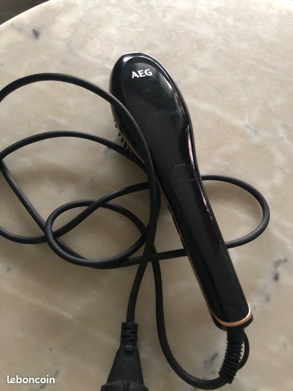 Brosse à cheveux éléctrique (image 2)