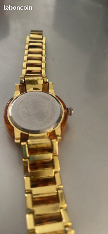Montre femme Michael Khors dorée avec bracelet et détails en écaille de tortue (image 2)