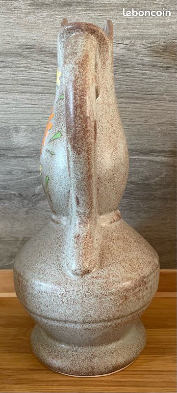 Pichet en céramique craquelée décoré