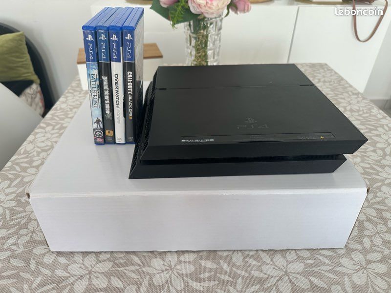 PS4 Slim avec jeux (image 1)