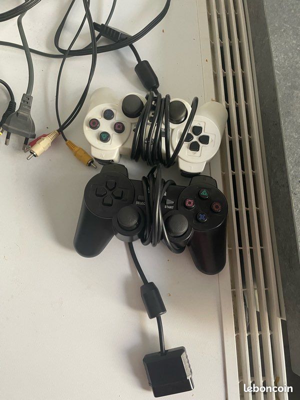 PlayStation 2 slim + manettes + jeux (image 4)