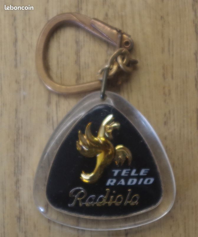 Ancien porte-clés coque plastique "Télé-Radio RADIOLA - PELLICIER Distributeur Officiel (Tours)" (image 1)