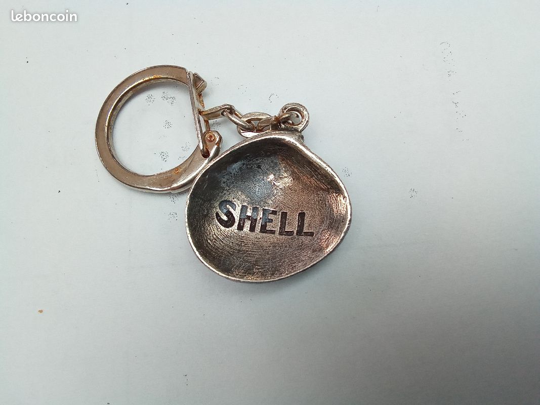 Ancien porte clé clef collection mécanique automobile logo coquillage Shell métal relief années 60 (image 1)