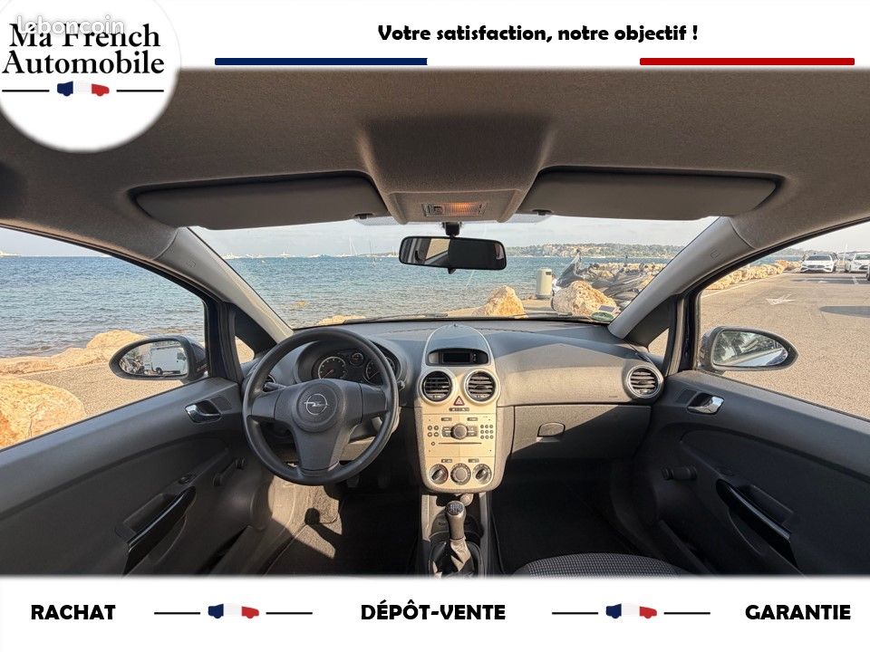 OPEL CORSA D 60ch - 1 ER MAIN - ENTRETIEN A JOUR - 3 CLÉS - GARANTIE - IDÉAL JEUNE CONDUCTEUR - RADIO - KIT ANTI-CREVAISON - PRISE 12V - ISOFIX - RÉGLAGE VOLANT - TAPIS CAOUTCHOUC - PROTEGE COFFRE (image 2)
