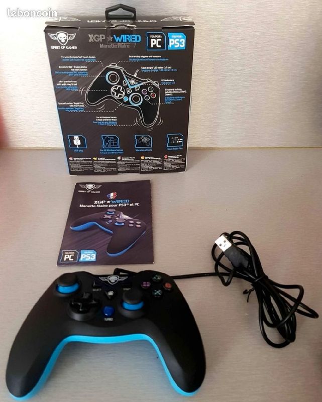 Manette de jeux dans son emballage (image 1)