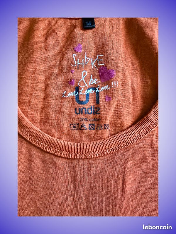 Débardeur Orange Corail Undiz – 100% Coton – Message "Shake & Be Love" – Taille 38 (M) – Très Bon État
Description : (image 3)